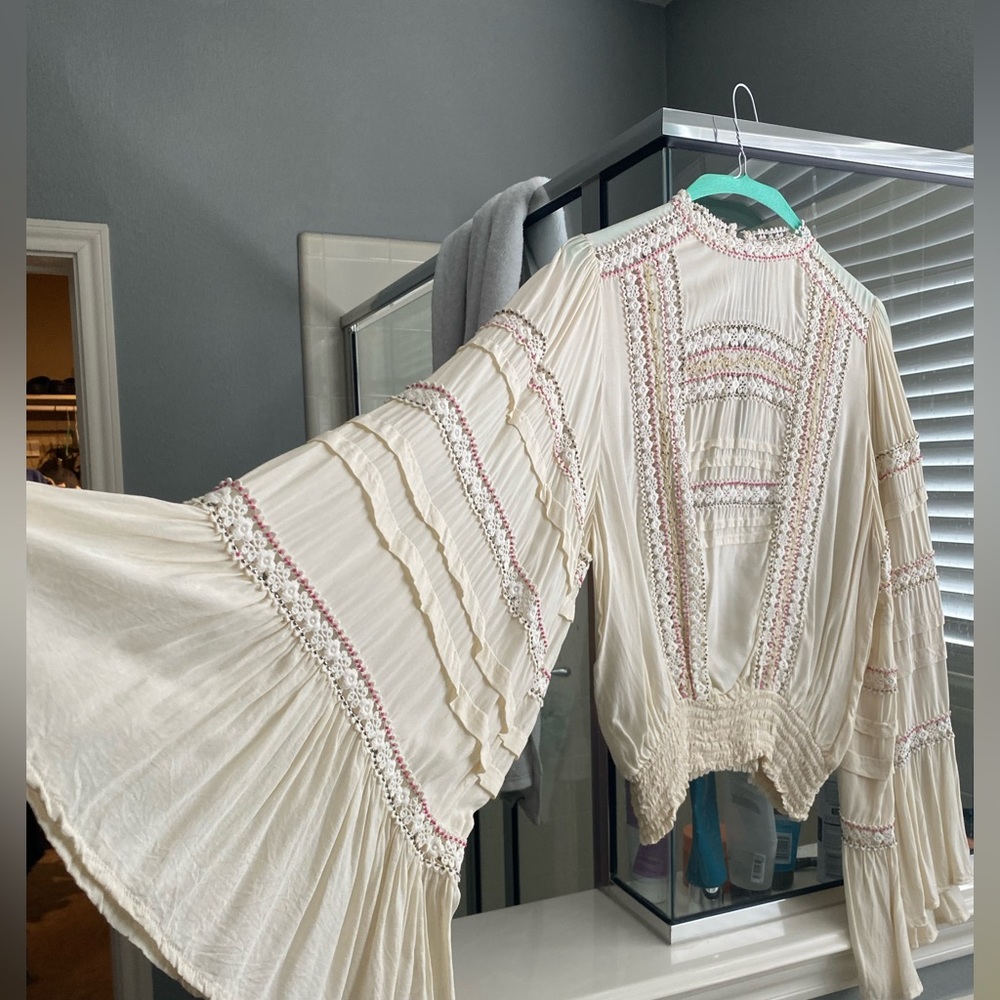 Beaded flare sleeve high neck top